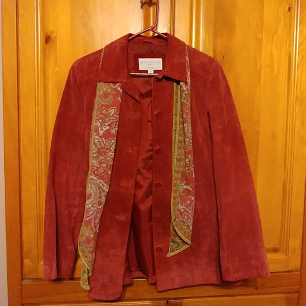 Mauve colored long leather jacket